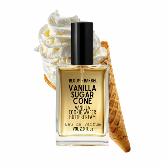Bloom + Barrel Vanilla Sugar Cone Eau de Parfum in a clear rectangular bottle with a black cap, shown in front of whipped cream and a vanilla waffle cone on a white background.