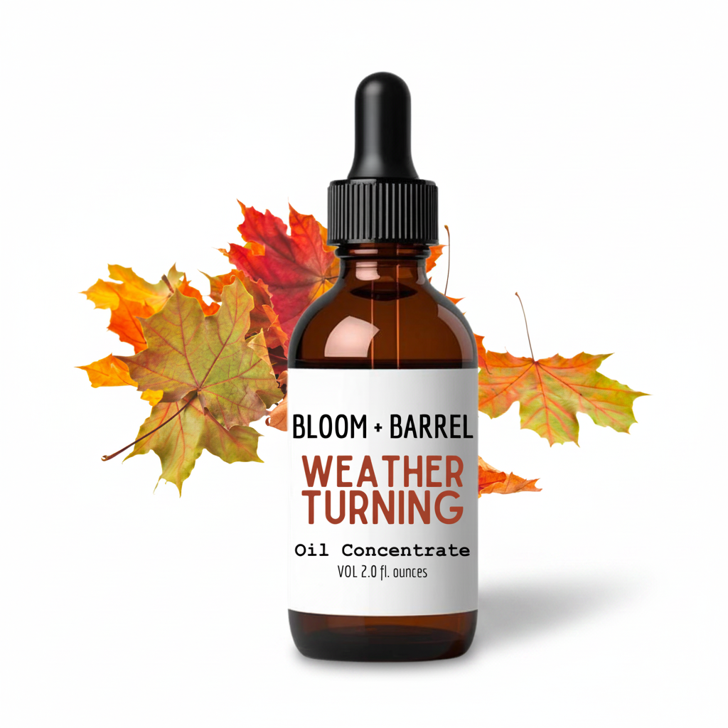 Bottle of 'Weather Turning' oil concentrate with autumn leaves on a white background