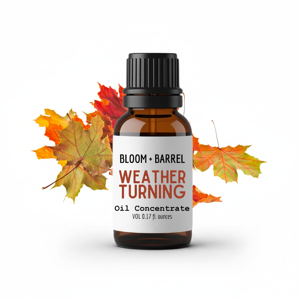 Bottle of 'Weather Turning' oil concentrate with autumn leaves on a white background