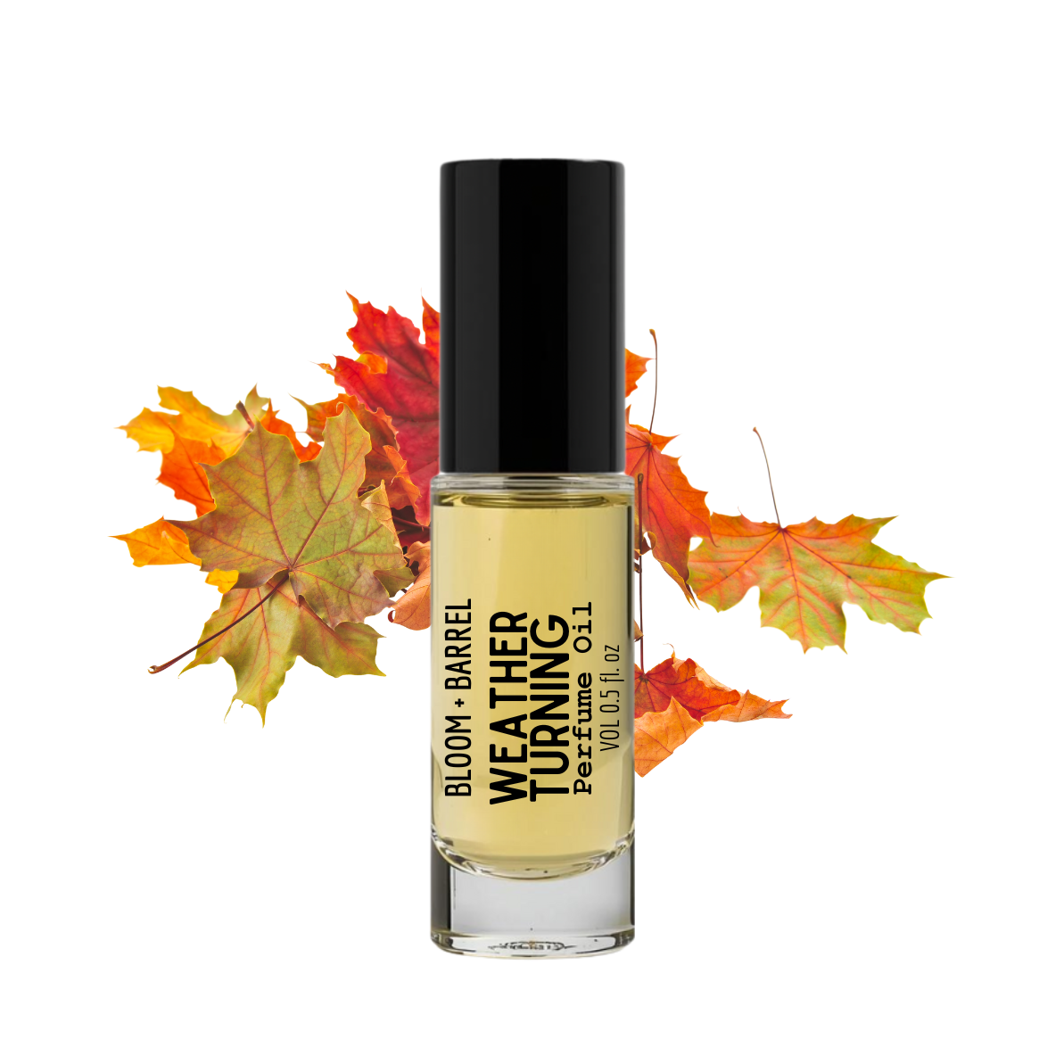 Bottle of 'Weather Turning' perfume with autumn leaves on a white background