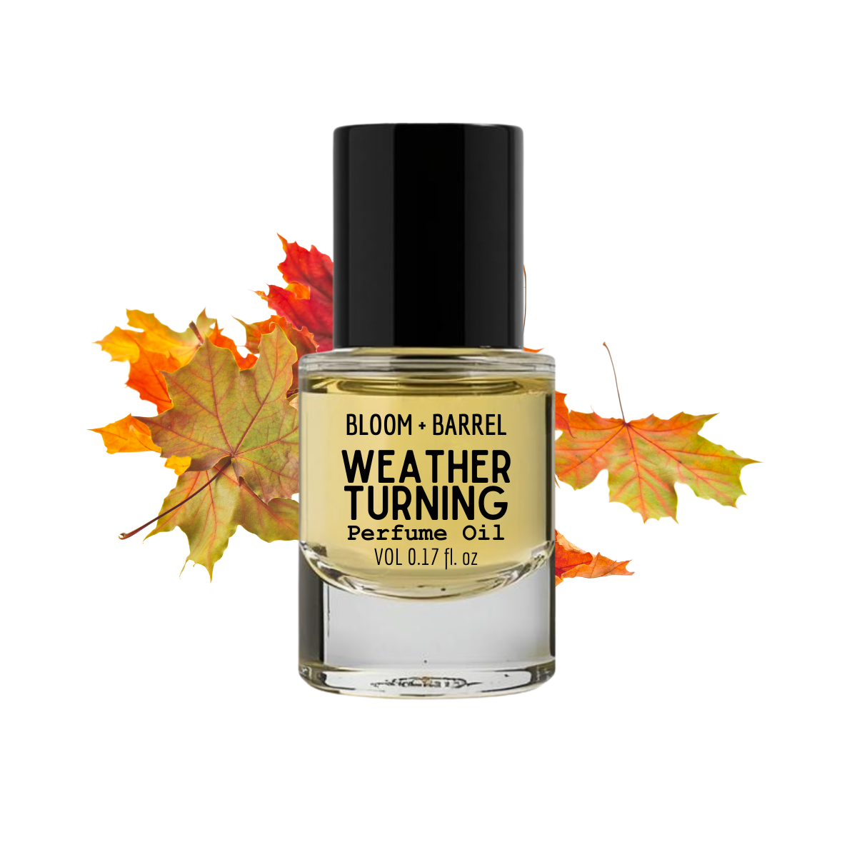 Bottle of 'Weather Turning' perfume oil with autumn leaves on a white background