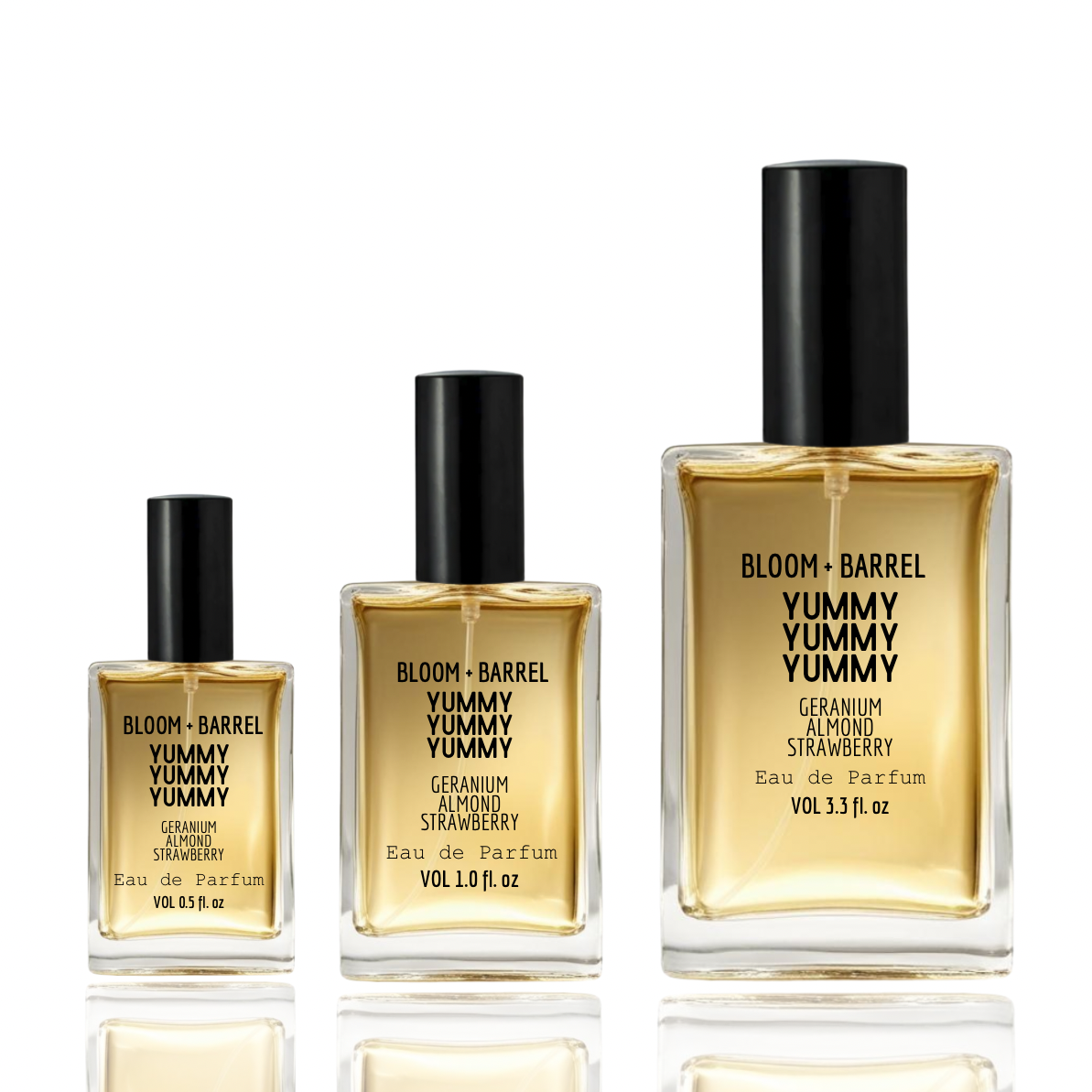 Three bottles of Bloom + Barrel Yummy Yummy Yummy perfume on a white background