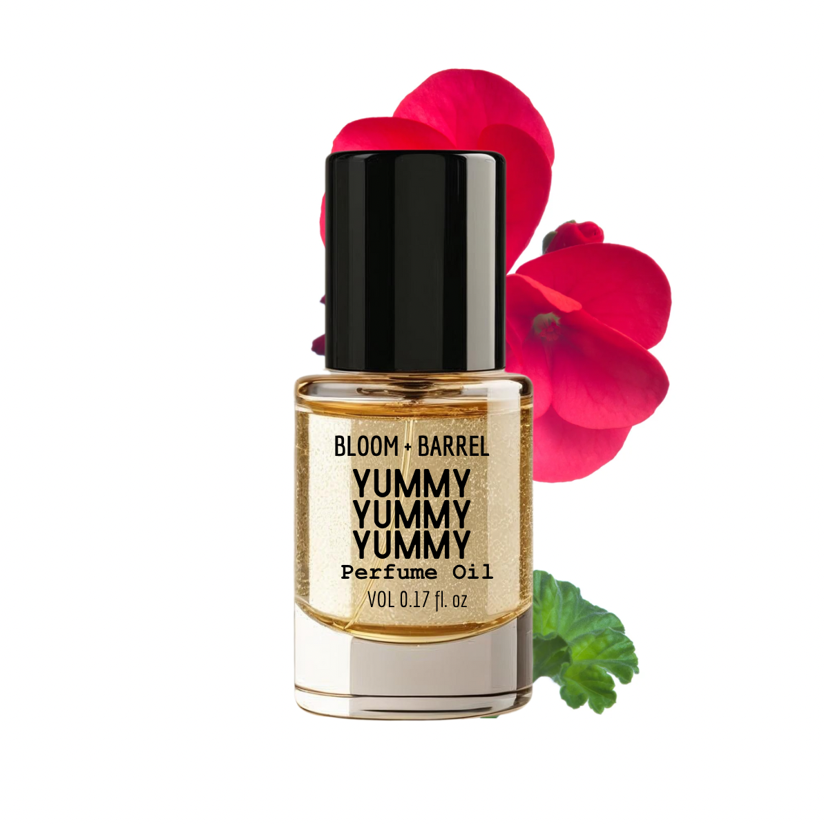 Bottle of Bloom & Barrel Yummy Yummy Perfume Oil with red flowers in the background
